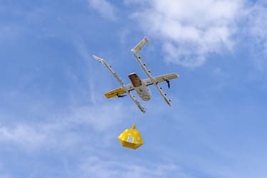 A drone flies a parcel..